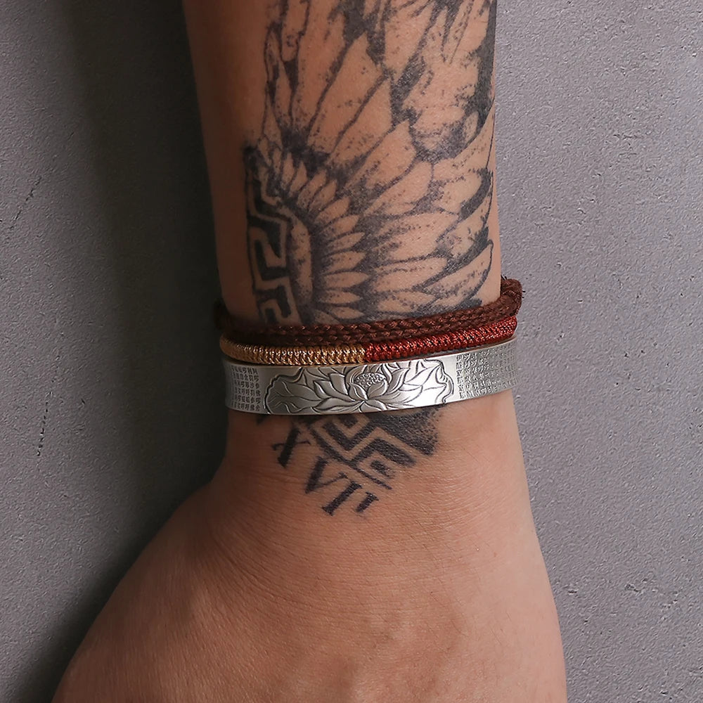 lotus bangle on hand