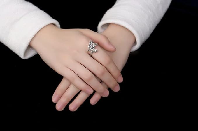 lotus ring worn on finger