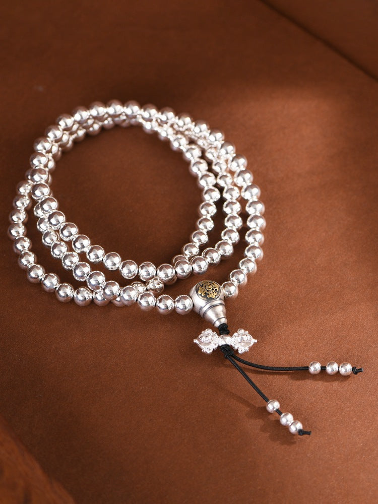 mala necklace styled in loop presentation