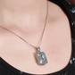 moonstone locket pendant worn on woman neck