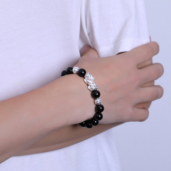 obsidian bracelet on wrist