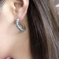 octopus tentacle earrings worn on ear