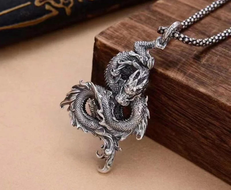 oxidized silver dragon charm close up