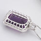 purple gemstone pendant on hand styling