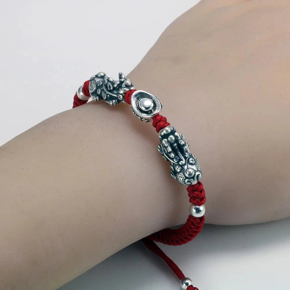 Sterling silver Pixiu charm on model