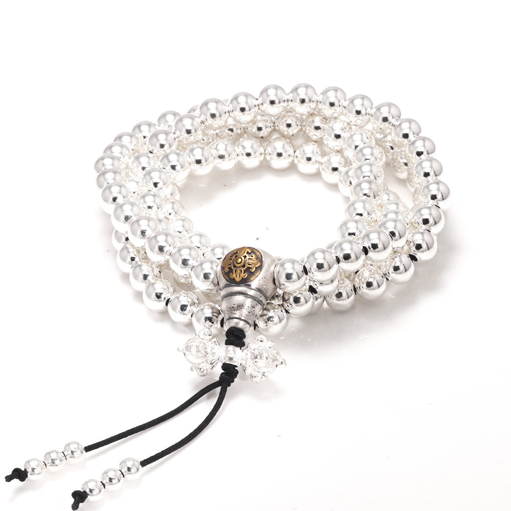 silver 108 mala necklace on white background
