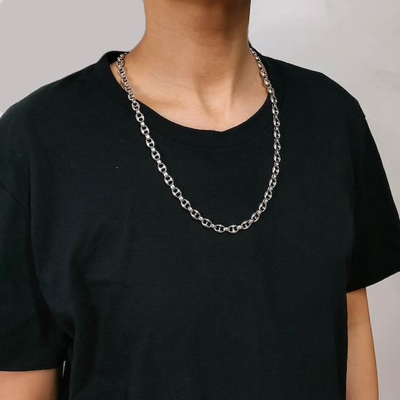 silver anchor chain necklace worn on chest