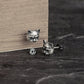 silver cat studs detail