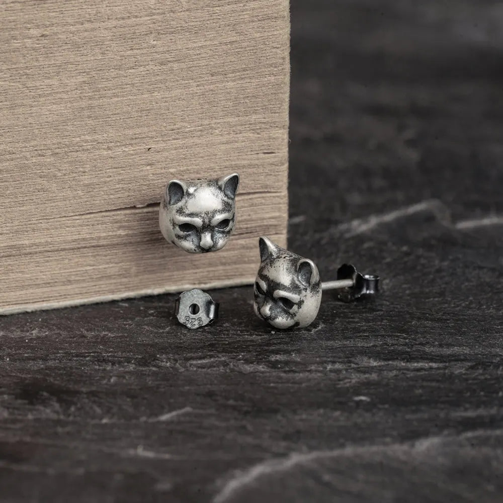 silver cat studs detail