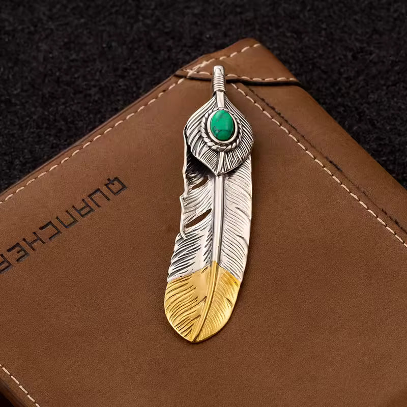 silver gold feather pendant with green turquoise