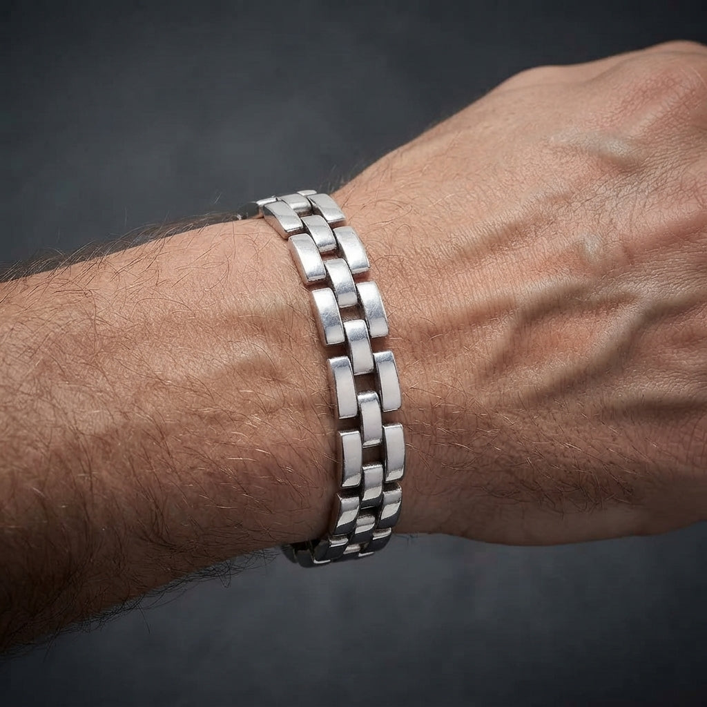 silver link bracelet on men wrist