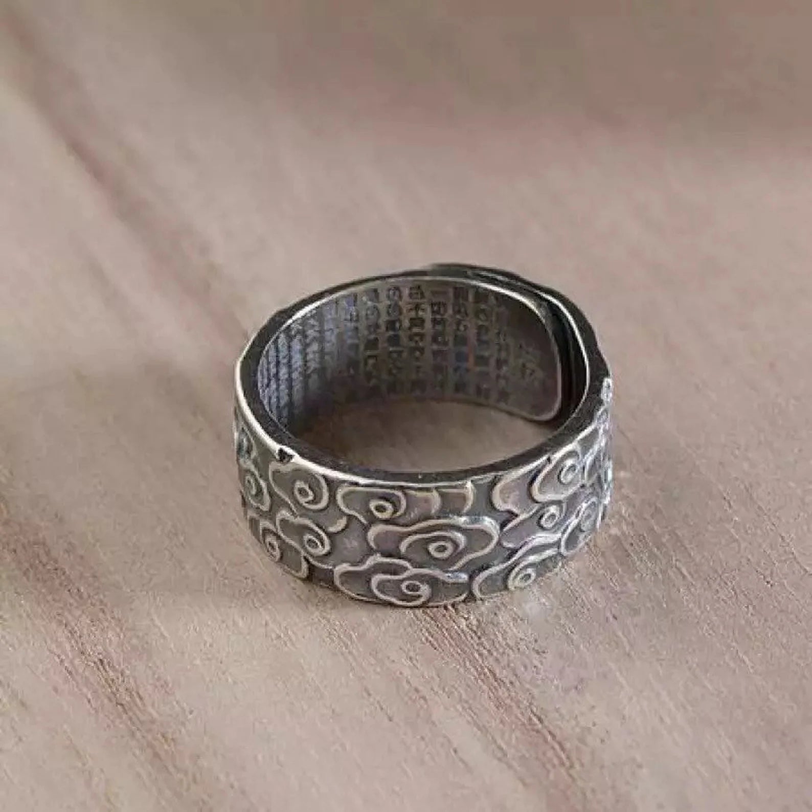silver lucky clouds heart sutra ring closeup 