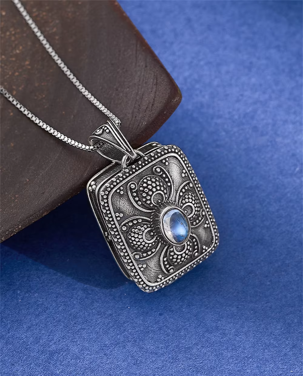 silver moonstone locket side angle detail