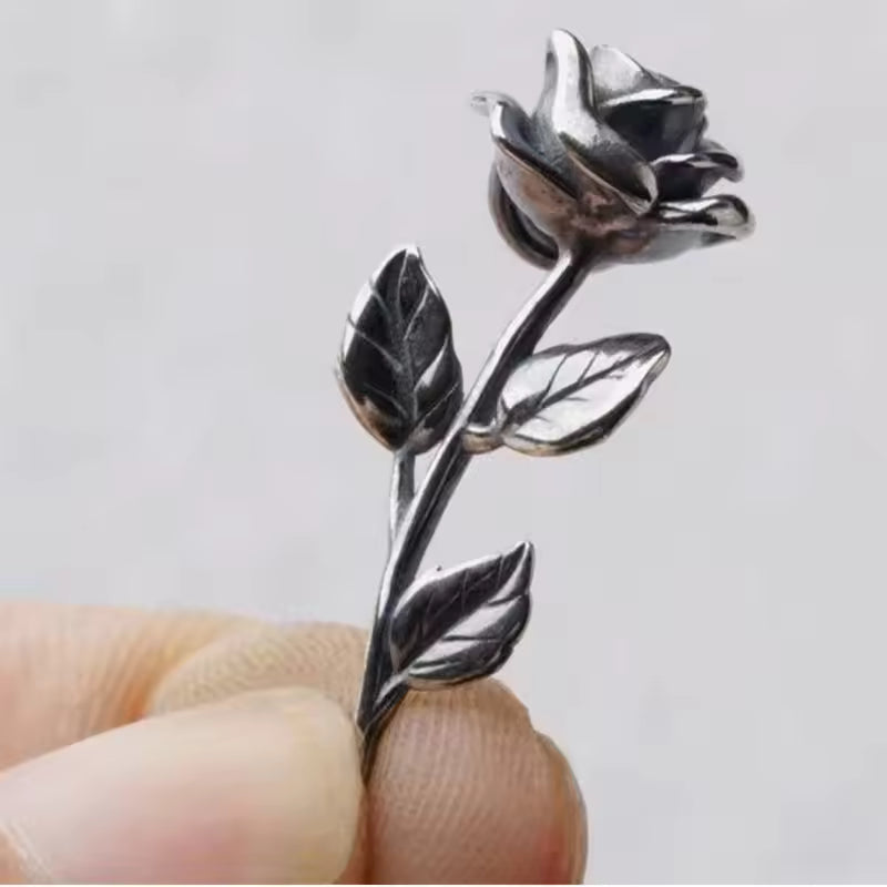 silver rose stem pendant close up view