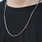 silver snake chain on neck