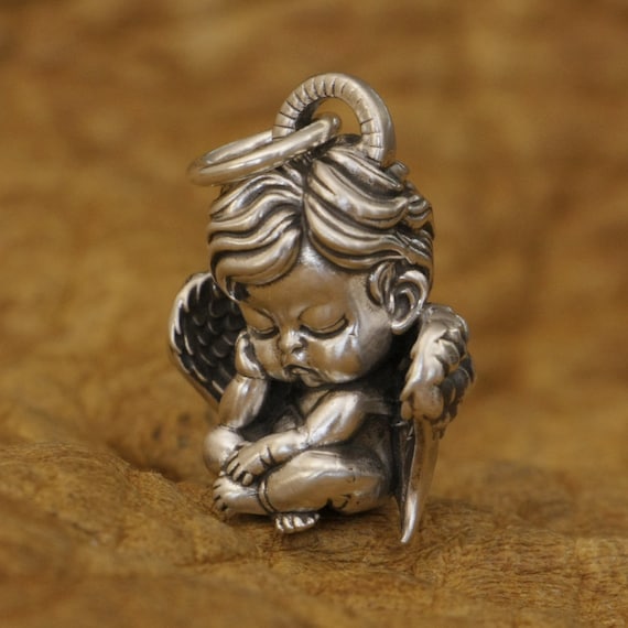 solid 925 sterling silver baby angel pendant close up