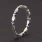 stackable silver fish ring close up