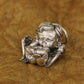 sterling silver baby angel wing pendant lying flat