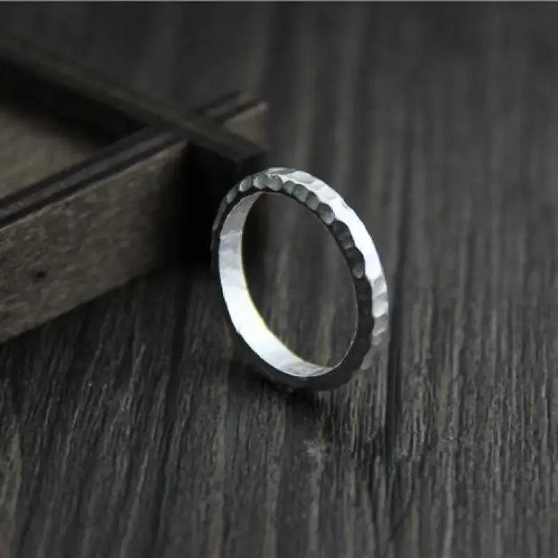 thin silver band close up texture