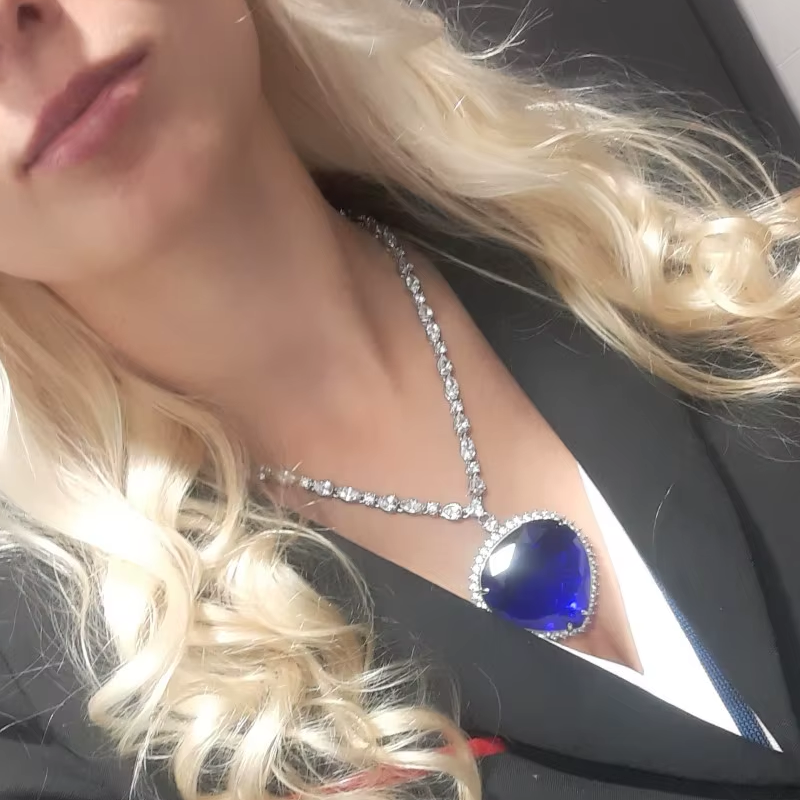 titanic inspired heart necklace on model