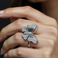 women wearing butterfly silver ring