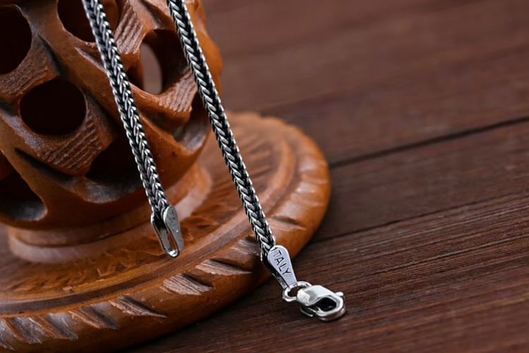 woven silver chain close up texture